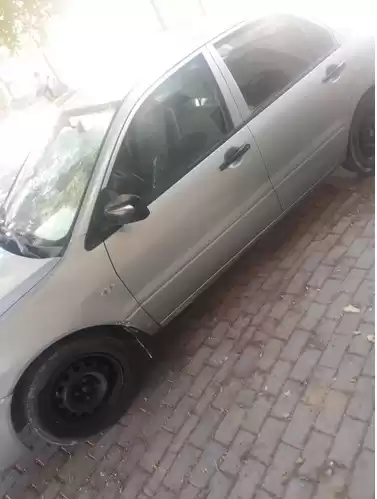 مستعملة Mitsubishi Lancer للبيع في الدوحة #5717 - 1  صورة 